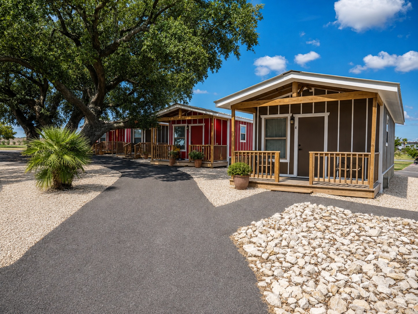 Charming cabin rentals surrounded by trees at Rivercity RV Park