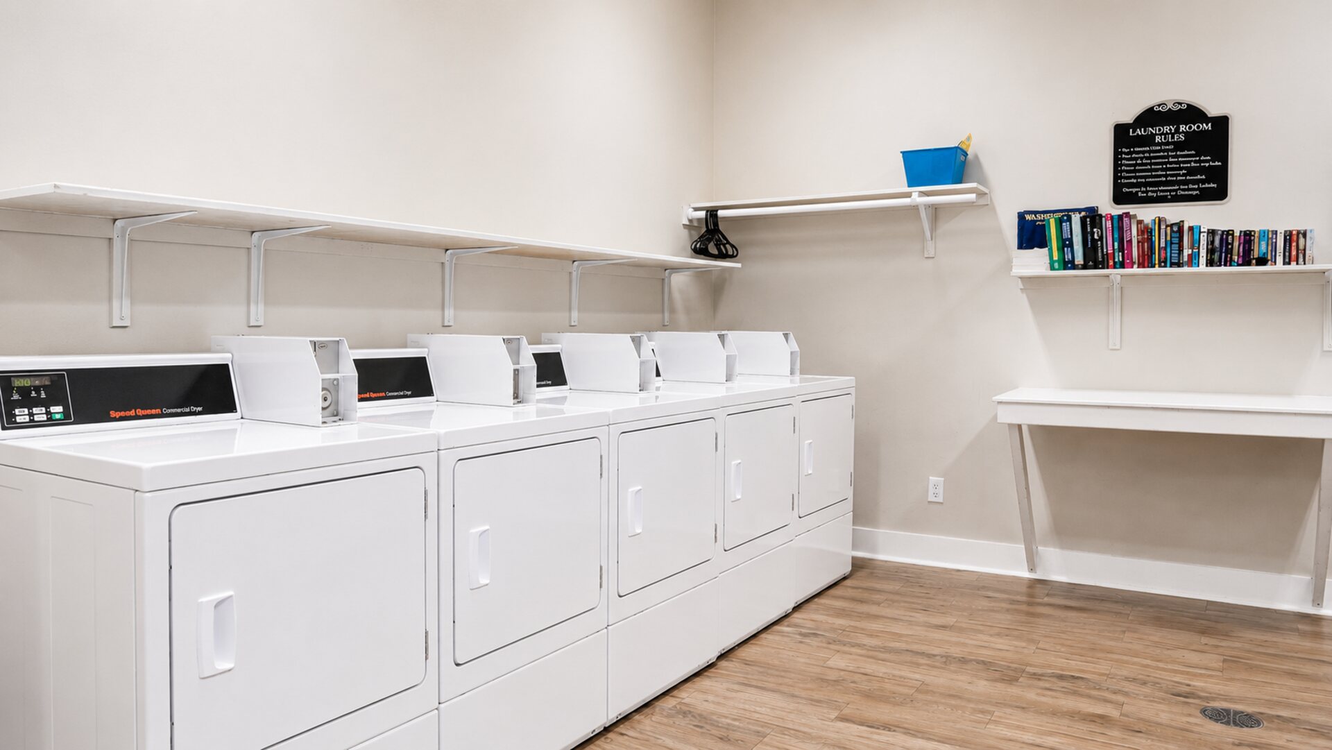 Onsite laundry facility with rows of dryers
